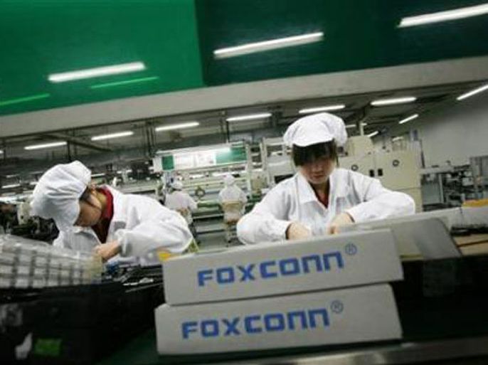 Apple, supplier Foxconn to share costs on improving factories