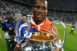 MUNICH, GERMANY - MAY 19: Didier Drogba of Chelsea celebrates with the trophy after their victory in the UEFA Champions League Final between FC Bayern Muenchen and Chelsea at the Fussball Arena München on May 19, 2012 in Munich, Germany. (Photo by Alex Livesey/Getty Images)