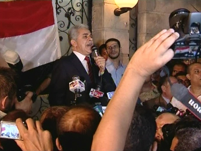 ‪‬ صباحي تحدث عن انتهاكات شابت المرحلة الأولى من الانتخابات(الجزيرة)