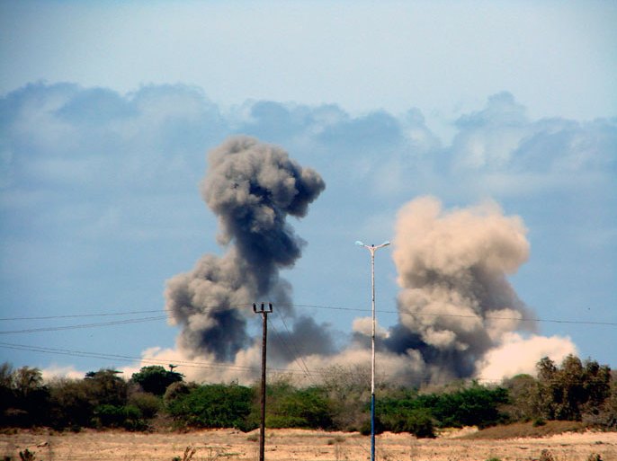 A handout photo made available on 12 May 2012 by the Yemeni Defense Ministry shows thick smoke and dust rising from an area during alleged clashes between the Yemeni army troops and al-Qaeda-linked militants in the southern province of Abyan, Yemen, 11 May 2012