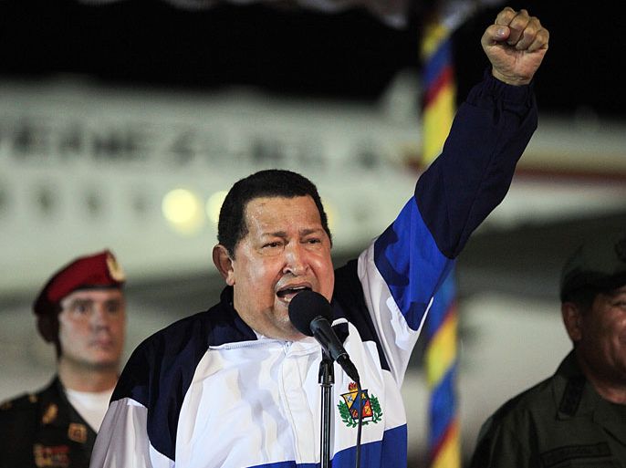 VENEZUELA : Venezuelan President Hugo Chavez speaks upon arrival in Caracas on May 12, 2012 after a week in Havana where he received what was supposed to be his final session of radiation therapy for cancer. Chavez, 57, has undergone surgery twice in the past year to remove cancerous tumors,
