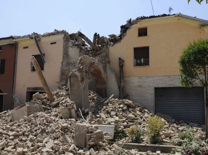 ITALY : A view of a tower which collapsed on May 29, 2012 after a earthquake in San Felice sul Pannaro, already hit by another earthquake on May 20. At least eight people were killed on Tuesday when a strong earthquake rocked northeastern Italy, just nine days after another quake in the same region wrought death and destruction. AFP PHOTO