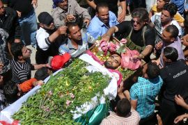 A handout image released by the Syrian opposition's Shaam News Network on May 26, 2012, shows the funeral of Abdelkader Tahina in the Syrian town of Dael. AFP PHOTO/HO --- RESTRICTED TO EDITORIAL USE - MANDATORY CREDIT "AFP PHOTO / HO / SHAAM