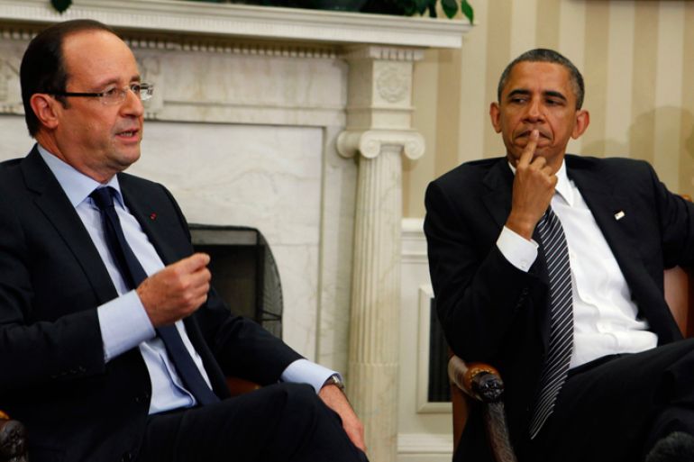 U.S. President Barack Obama listens to French President Francois Hollande in the Oval Office of the White House in Washington May 18, 2012. Hollande is in the United States to join other leaders of the major industrial economies and meet for a G8 Summit at Camp David this weekend to try to head off a full-blown financial crisis in Europe. REUTERS