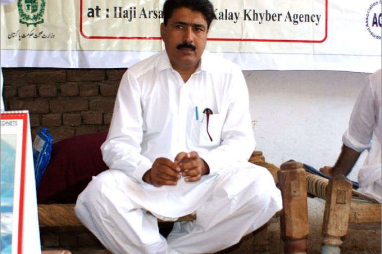 This photograph taken on July 22, 2010, shows Pakistani surgeon Shakeel Afridi, who was working for CIA to help find Osama bin Laden, attending a Malaria control campaign in Khyber tribal district. Pakistan's problematic relationship with the United States sailed into fresh controversy as US lawmakers warned of aid cuts after the jailing of a surgeon who helped the CIA hunt down Osama bin Laden. Shakeeel Afridi was found guilty of treason, sentenced to 33 years in prison and fined 320,000 rupees (3,500 USD) under an archaic tribal justice system that has governed Pakistan's semi-autonomous tribal belt since British rule. AFP PHOTO / MOHAMMAD RAUF