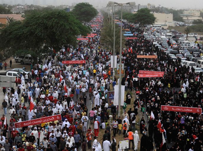 Tens of thousands of anti-government protesters are seen marching on Budaiya highway west of Manama, in a rally held to condemn the Bahrain Saudi union on the Budaiya highway, west of Manama, May 18, 2012. Tens of thousands of mainly Shi'ite protesters rallied in Bahrain on Friday against proposals for closer ties with other Gulf Arab countries, a plan pushed by Saudi Arabia to contain dissent in Bahrain and counter Iran's regional influence. REUTERS