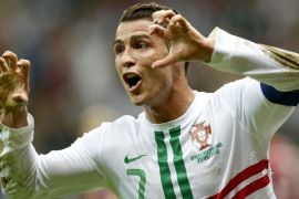 epa03275997 Cristiano Ronaldo of Portugal celebrates after scoring the opening goal during the quarter final match of the UEFA EURO 2012 between the Czech Republic and Portugal in Warsaw, Poland, 21 June 2012
