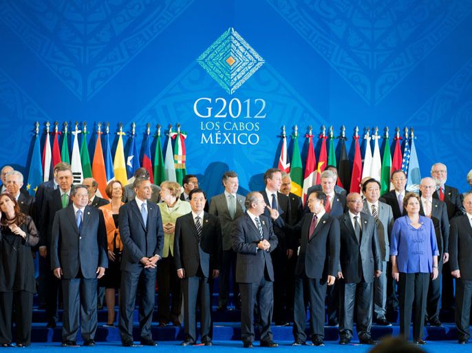 epa03272412 Group photo at the G20 Summit in Los Cabos, Mexico, 18 June 2012. The G20 formally began its meeting in Los Cabos, Mexico, with the European financial crisis at the top of its agenda one day after Greek voters voiced support for a pro-bailout party that aims to keep Athens in the eurozone. EPA/PEER GRIMM