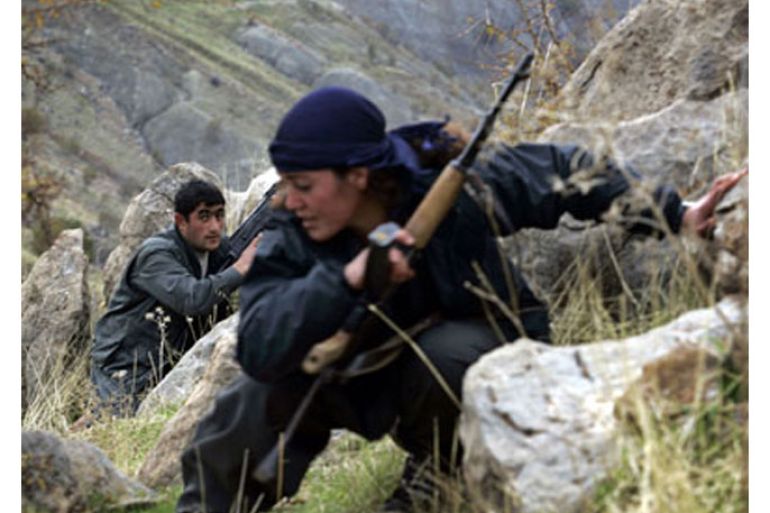 afp: (files) file picture dated 18 november 2006 shows pkk guerillas storming a hilltop as they conduct military exercises in the mountains of northern iraq's kurdish autonomous region. (الفرنسية)