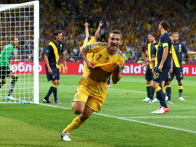 KIEV, UKRAINE - JUNE 11: Andriy Shevchenko of Ukraine celebrates scoring their second goal during the UEFA EURO 2012 group D match between Ukraine and Sweden at The Olympic Stadium on June 11, 2012 in Kiev, Ukraine. (Photo by Alex Livesey/Getty Images)