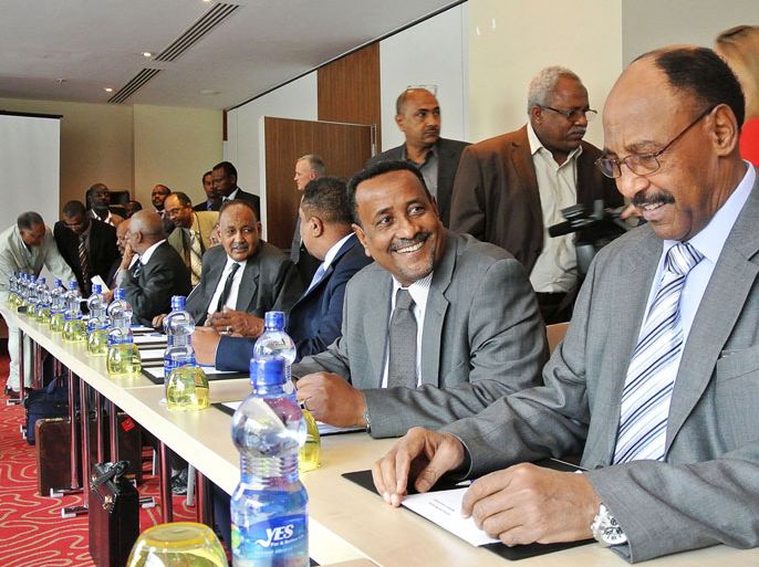 Sudan's Defence Minister Abdelrahim Mohamed Hussein (R) sits next to the Sudan's Interior Minister Ibrahim Mahmud Ahmad at the opening of border security talks between Sudan and South Sudan in Addis Ababa on June 4, 2012. Delegations from the two countries, including the ministers of defense from both sides, have been holding talks in the Ethiopian capital following heavy clashes last month that took the foes to the brink of all-out war. A May 2, 2012, United Nations report called for a swift resolution on a number of outstanding disputes between Khartoum and Juba, including border demarcation and how to split oil revenues. AFP PHOTO/JENNY VAUGHAN