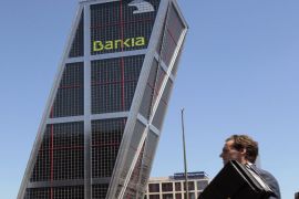 epa03228678 (FILE) File picture taken 15 July 2011 shows the Bankia headquarters, formerly the CajaMadrid headquarters, in Madrid, Spain, 15 July 2011. Troubled Spanish bank Bankia will need more funds than expected from the state following its recent nationalization, Economy Minister Luis de Guindos said, 21 May 2012. Bankia will need up to 7.5 billion euros (9.6 billion dollars) in addition to the 4.5 billion euros in credits that were initially injected into it from