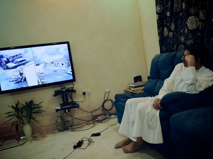 Bahraini Secretary General of Al-Wefaq opposition group, Sheikh Ali Salman sits at his house as he watches a video of the demonstration that he was wounded in Bilad al-Qadeem village, near Manama on June 22, 2012. Bahraini security forces fired rubber bullets to disperse an unauthorised rally
