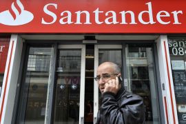 epa03223652 A pedestrian passes a Santander Bank branch in Oxford Street in