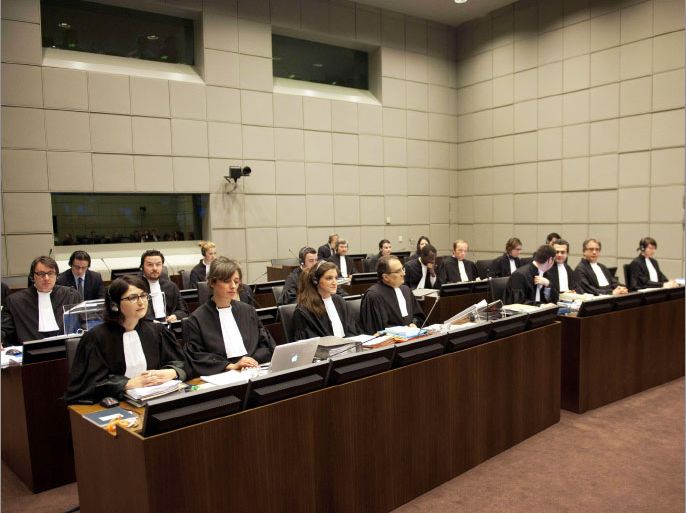 (front row, L-R) Defence council R.Maison, Pauline Baranes, S. Codde and Antoine Korkmaz of the UN Special Tribunal for Lebanon attend the opening of the public hearing in the assassination case of former Lebanese prime minister Rafiq Hariri, at the court in Leidschendam, near The Hague, on June 13, 2012. Lebanon's special UN-backed tribunal hears arguments by defence teams who are challenging the court's legitimacy to try their clients -- four Hezbollah members accused of murdering former prime minister Rafiq Hariri in 2005. AFP PHOTO / POOL / ROBERT VOS POOL ***NETHERLANDS OUT***