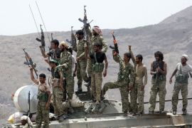 A handout image made available by the Yemeni Ministry of Defense on June 13, 2012, shows Yemeni soldiers celebrating after the army seized the Al-Qaeda strongholds of Jaar and the provincial capital Zinjibar on June 12, more than a year after the jihadists captured most of the Abyan province. Al-Qaeda militants had overrun most of the southern province early last year, taking advantage of the weakening of the central government by Arab Spring-inspired protests in the major cities. AFP PHOTO/HO/YEMENI MINISTRY OF DEFENCE/HO == RESTRICTED TO EDITORIAL USE - MANDATORY CREDIT "AFP PHOTO / YEMENI MINISTRY OF DEFENCE " - NO MARKETING NO ADVERTISING CAMPAIGNS - DISTRIBUTED AS A SERVICE TO CLIENTS