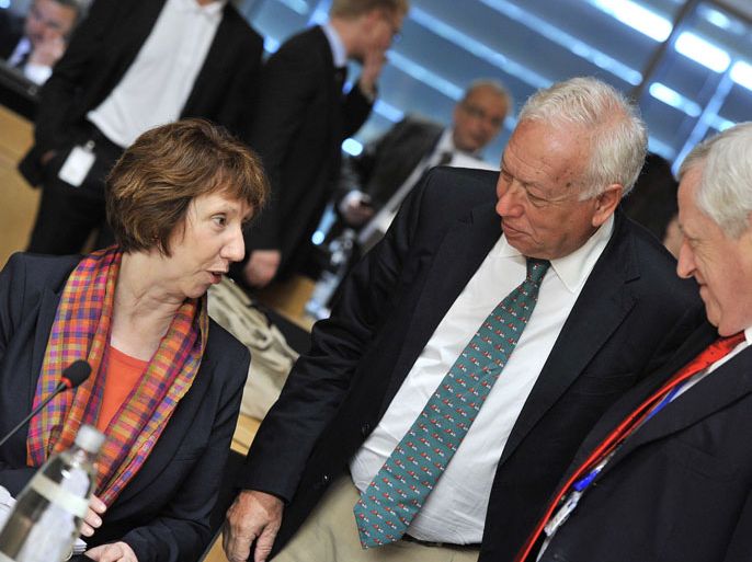 LUXEMBOURG : (From L) High Representative of the European Union for Foreign Affairs and Security Policy Catherine Ashton, Spanish Foreign minister José Manuel Garcia Margallo and General Secretary for EU external Affairs Pierre Vimont talk prior a Foreign Affairs Council on June 25, 2012 at the Kirchberg conference center in Luxembourg. The Council, will discuss the situation in the EU's southern neighbourhood, in particular the latest developments in Syria and Egypt. A further topic of discussion will be Pakistan, following the recent visit of the EU High Representative to that country.