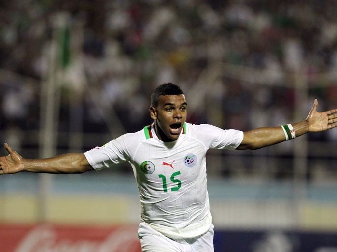 epa03247015 Algerian player El Arabi Hilal Soudani celebrates a goal against Rwanda during their 2014 FIFA World Cup qualification CAF Second Round Group H soccer match at Mustapha Tchaker Stadium in Blida 50 km South of Algiers, Algeria, 02 June 2012. EPA/MOHAMMED MESSARA