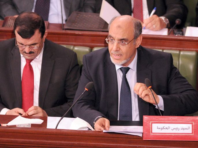 TUNISIA : Tunisian Prime Minister Hamadi Jebali (R) gives a speech at the Tunisian Constituent Assembly on June 29, 2012 in Tunis. Jenali criticized the "contempt" of those who accuse Libya of "not respecting human rights", justifying in front of the Constituent Assembly his decision to extradite the former Libyan Prime Minister Mahmoudi. AFP PHOTO / KHALIL
