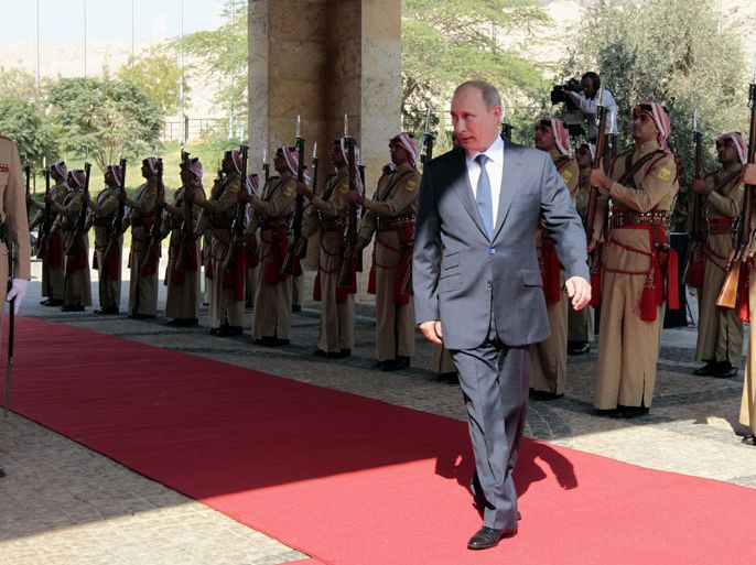 : Russian President Vladimir Putin arrives for a meeting with Jordan’s King Abdullah II on the Jordanian side of the Dead Sea on June 26, 2012. Putin held talks with King Abdullah II as part of a Middle East tour aimed at boosting Moscow regional role. AFP PHTO/KHALIL MAZRAAWI