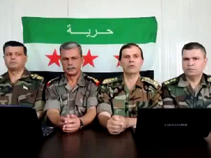 An image grab taken from a video uploaded on YouTube on June 22, 2012 allegedly shows five Syrian officers from the government forces, identified as (from L-R) Colonel Ismail Zakaria, Brigadier Abdullah Zakaria, Brigadier Mohammad Zakaria and Colonel Abdul Hamid Zakaria, announcing they are defecting from the army of the Syrian regime and joining the Syrian revolution
