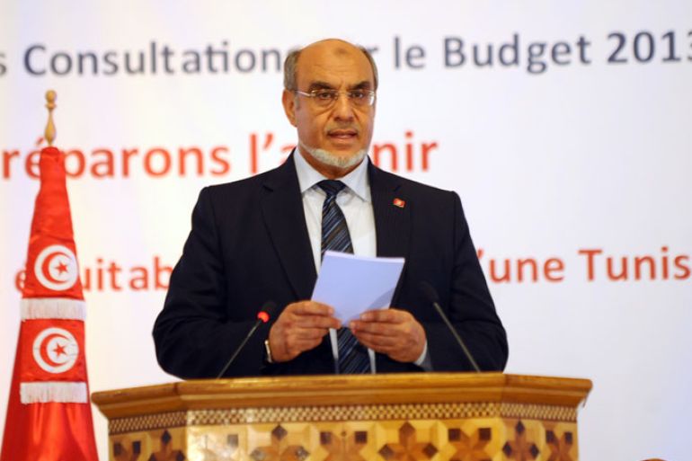 -, TUNISIA : Tunisian Prime Minister Hamadi Jebali speaks at the start of a seminar on "Launching Consultations on the 2013 budget, Preparing for the Future for more Equitable and Inclusive Development in the new Tunisia" on June 23, 2012, in Tunis. The seminar was also attended by American Nobel Prize in Economy winner Joseph Stiglitz and Mustapha Kamel Nabli, a Tunisian economist and the Governor of the Central Bank of Tunisia. AFP PHOTO / FETHI BELAID