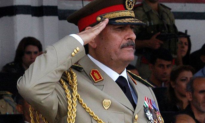 (FILES) A handout picture released by the official Syrian Arab News Agency (SANA) on October 12, 2011 shows Syrian General Fahd al-Freij saluting during the graduation ceremony of female cadets in Damascus. Syrian President Bashar al-Assad appointed Freij as the country's new defence minister on July 18, 2012 after a suicide bombing killed two top regime officials including defence minister General Daoud Rajha. AFP PHOTO/HO/SANA