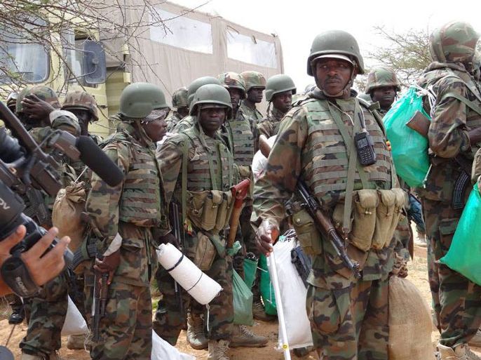 1- جنود من القوات الإفريقية لدى سيطرتهم على مدينة بلعد على بعد 30 كم شمال العاصمة في نهاية هذا الشهر الماضي.