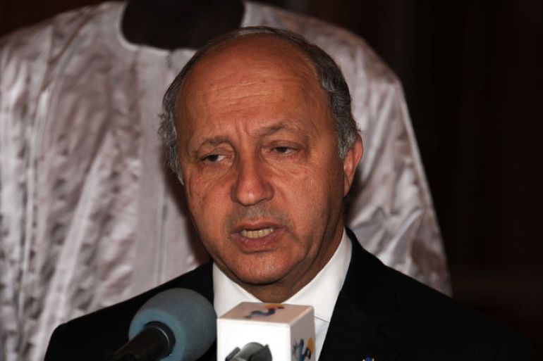 5802 - N'Djamena, -, CHAD : French foreign Minister Laurent Fabius speaks to reporters following a meeting with Chad's president Idriss Deby Itno on July 28, 2012 at the presidential palace in N'djamena. Laurent Fabius on his first visit to sub-saharan Africa since he took up his post in May. AFP PHOTO / STR