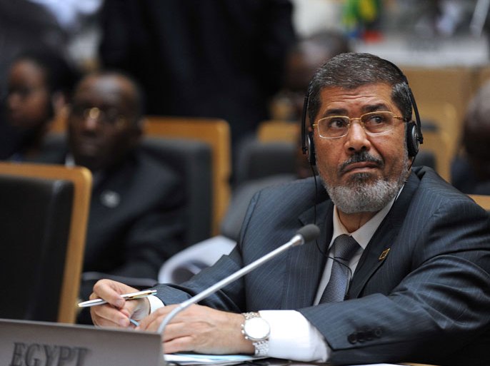 ETH02 - Addis Ababa, -, ETHIOPIA : Egypt's newly-elected president Mohamed Morsi attends on July 15, 2012 the African Union summit by the heads of state and government in Addis Ababa. African leaders hold a summit to discuss the continent's hotspots and try and agree on a new head for the African Union's executive body after a deadlocked vote in January. AFP PHOTO/SIMON MAINA
