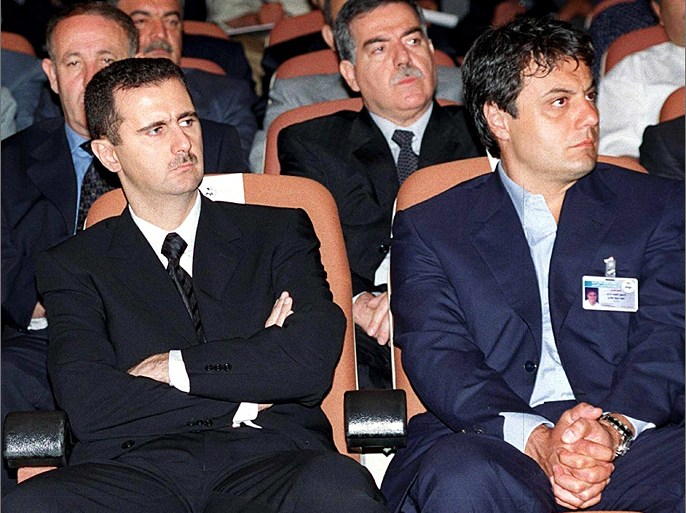 epa03297543 (FILE) A handout file picture dated 18 June 2000 made available by the official Syrian Arab News Agency (SANA) showing Syrian President Bashar al-Assad (L) and Manaf Tlass (R) attending the ninth congress of the ruling Baath Party in Damascus, Syria. Media reports on 05 July 2012 state that Republican Guards Brigadier General Manaf Tlass, a childhood friend of Syrian President Bashar al-Assad, had defected. French Foreign Minister Laurent Fabius told the Friends of Syria conference on 06 July that Tlass was on his way to Paris, where he is said to have family. EPA/SANA/HANDOUT HANDOUT EDITORIAL USE ONLY/NO SALES