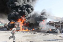 Flames rise from an oil tanker reportedly carrying oil for NATO forces, after it was attacked by suspected Taliban militants, in Pol-e-Khomri city of Baghlan province, Afghanistan, 28 June 2012.