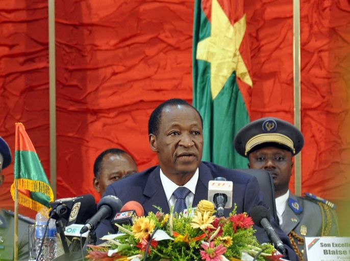 Burkina Faso's President Blaise Compaore (C) speaks during talks on Mali, in Ouagadougou, on July 7, 2012. West African leaders met in Burkina Faso on July 7 with civil leaders from Mali amid moves to create a government of national unity to tackle a crisis in Northern Mali where Islamists have enforced sharia law. Burkinabe President Blaise Compaore, mediator for the Economic Community