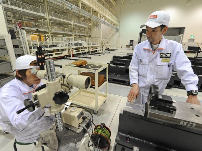 epa02097463 In this photo released 29 March, 2010, Mazak Optonics Corporation technicians assemble precision tool manufacturing machines for international clients at the company's underground Phoenix Laboratory in Gifu