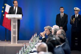 French President Francois Hollande delivers a speech during a meeting of the "Friends of the Syrian People" at the MFA Conference Center July 6, 2012 in Paris, France. The Syrian conflict has become a threat to international peace and security, Hollande told a Friends of Syria meeting today, appealing to Russia to back regime change. "This crisis has become a threat to international peace and security," Hollande told the international meeting,