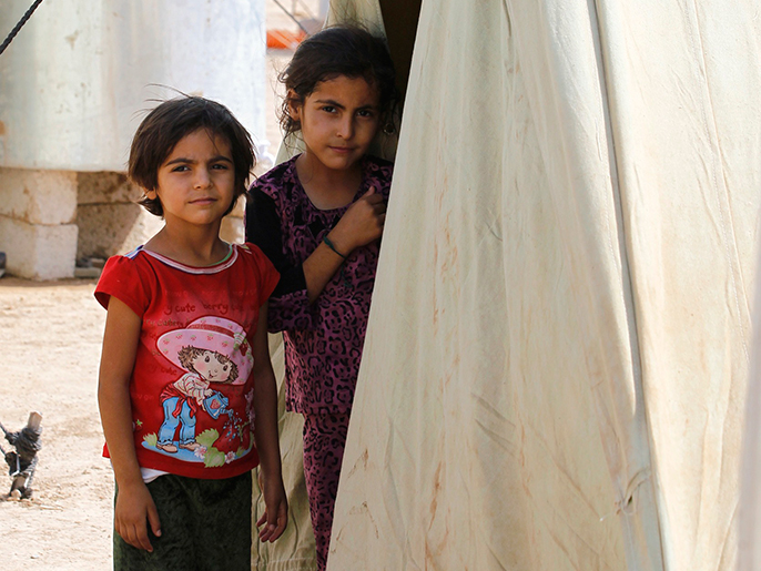‪الأطفال السوريون اللاجئون يروون قصصا مرعبة عما شاهدوه في بلادهم‬ (رويترز)