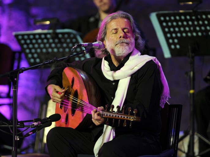 Lebanese singer Marcel Khalife performs at the Carthage international Festival at the Roman theatre in Carthage on July 15, 2012 in Tunis. AFP