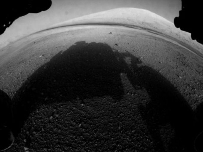 A handout photograph released by NASA on 07 August 2012 showing one of the first views from NASA's Curiosity rover, which landed on Mars the evening of 05 August 2012 PDT (early morning hours 06 August 2012 EDT). It was taken through a "fisheye" wide-angle lens on one of the rover's Hazard-Avoidance cameras. These engineering cameras are located at the rover's base. As planned, the early images are lower resolution. Larger color images are expected later in the week when the rover's mast, carrying high-resolution cameras, is deployed. EPA/NASA/JPL-Caltech / HANDOUT HANDOUT EDITORIAL USE ONLY