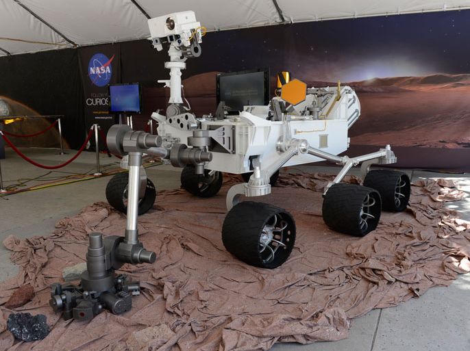 A model of the Mars Science Laboratory Curiosity rover is put on display at the Jet Propulsion Laboratory in Pasadena, California, USA, 05 August 2012. The Mars Curiosity rover is scheduled to touchdown on the Martian surface on 05 August 2012 and will explore the Red Planet for two years. The Curiosity robot is equipped with a nuclear-powered lab capable of vaporizing rocks and ingesting soil, measuring habitability, and potentially paving the way for human exploration. EPA/MICHAEL NELSON