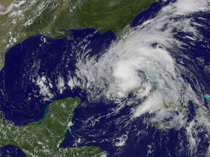 This August 26, 2012 GOES-East satellite image released by NOAA shows Tropical Storm Isaac (C) at 18:25 UTC. A strengthening Tropical Storm Isaac barreled toward Florida and was predicted to become a hurricane on Sunday, forcing a one-day delay to the main events of the Republican convention, after leaving four people dead in Haiti. With winds reaching 65 miles
