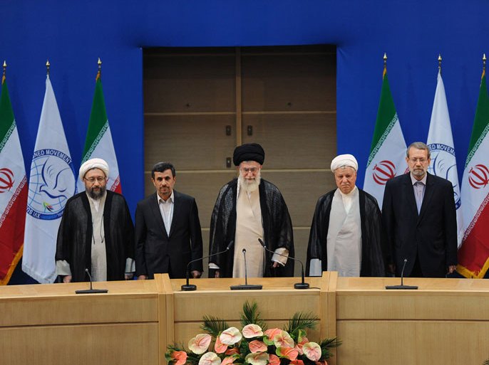 A handout picture released by the official website of Iran's Supreme leader Ayatollah Ali Khamenei (C) shows from (L to R) Iran's Judiciary Chief, Sadeq Larijani, President Mahmoud Ahmadinejad, Khamenei, former president Akbar Hashemi Rafsanjani and parliament speaker Ali Larijani attending the openeing session of the 120-member Non-Aligned Movement summit in Tehran on August 30, 2012.