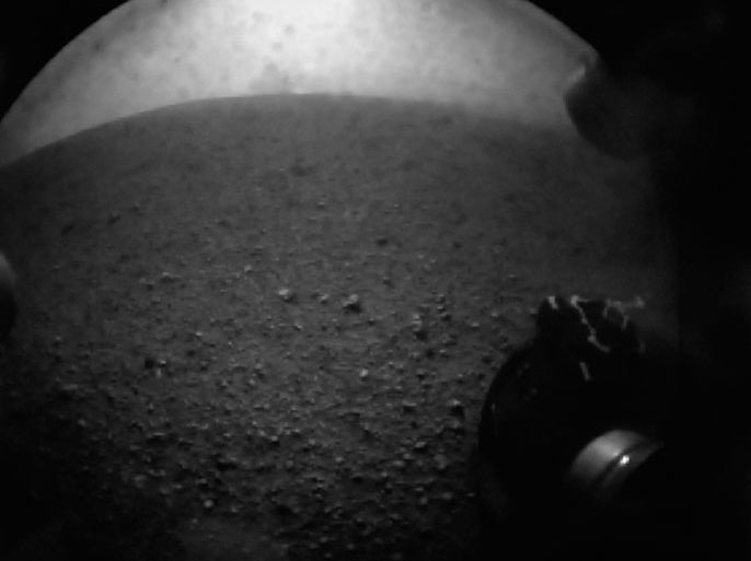 This handout image from NASA shows the first image from the Mars rover Curiosity after it successfully touch downed on the Martian surface 05 August 2012. The Mars Curiosity rover touchdown on the Martian surface on 05 August 2012 and will explore the Red Planet for two years. The Curiosity robot is equipped with a nuclear-powered lab capable of vaporizing rocks and ingesting soil, measuring habitability, and potentially paving the way for human exploration. EPA/NASA HANDOUT EDITORIAL USE ONLY