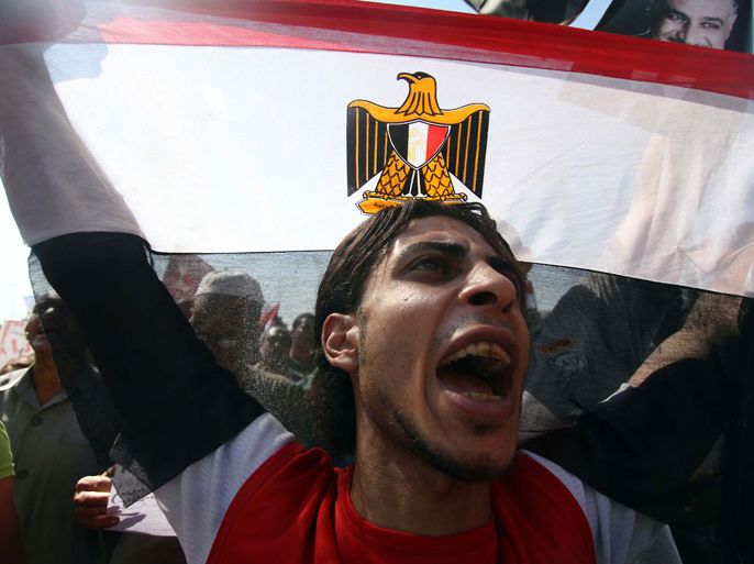 An anti Muslim Brotherhood protester shouts slogans against Muslim brotherhood during a demonstration in Nasr City, Cairo, 24 August 2012. Morsi's opponents Friday started a series of mass protests against him and his Muslim Brotherhood, accusing the party of monopolizing power and stifling freedom of expression. Hundreds of protesters gathered in other areas of Cairo, including at a military memorial and near the presidential palace in the east of the capital. They chanted slogans decrying Egyptian President Mohammed Morsi for retaking legislative powers from the military after ordering the retirement of top generals earlier in August. EPA/AHMED KHALED