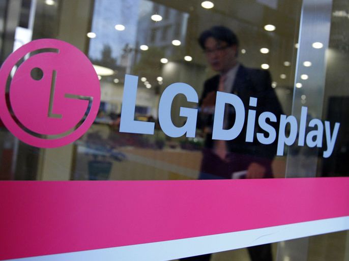 A man walks out of the headquarters of LG Display in Seoul, October 20, 2011. South Korean flat-screen maker LG Display, a key supplier to Apple Inc, posted a wider-than-expected quarterly loss on Thursday as tepid demand for TVs and PCs hit panel prices and one-off losses weighed.