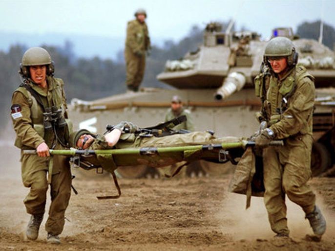 A photograph supplied by the Israeli Defense Forces (IDF) shows Israeli tanks and crew members on 10 February 2008 during military maneuvers on the Golan Heights. EPA/ISRAELI DEFENSE FORCES / HO EDITORIAL USE ONLY