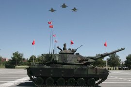 Turkish army's tanks and jets parade during the 90th anniversary of Victory Day in Ankara,on August 30, 2012. Turkey commemorates the anniversary of the day in 1922 that marked the end of Turkey's independence war with a victory over Greek occupation troops in Anatolia. AFP PHOTO/ADEM ALTAN