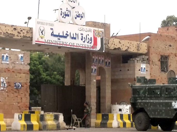 An armoured vehicle is parked outside the Interior Ministry in the Yemeni capital Sanaa, on July 31, 2012,