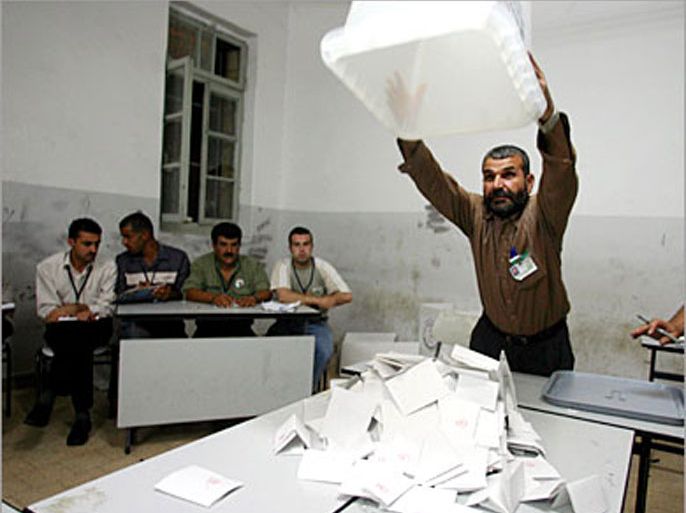 palestinian officals prepare to count the ballots after local elections in the west bank city of ramallah 29 september 2005. palestinians voted in more than 100 west bank