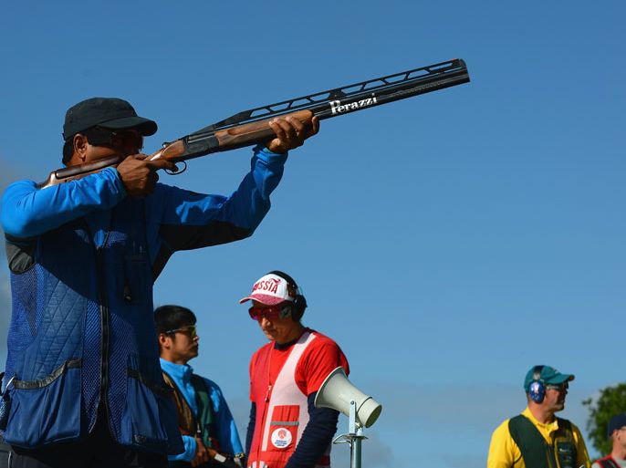 LONDON, ENGLAND - AUGUST 02: Fehaid Aldeehani of Kuwait competes in the Men's Double Trap Shooting qualification on Day 6 of the London 2012 Olympic Games at The Royal Artillery Barracks on August 2, 2012 in London, England. (Photo by Lars Baron/Getty Images)