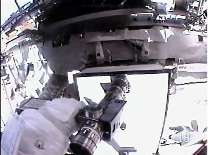 ISS02 - ISS, -, SPACE : Japanese astronaut Akihiko Hoshide attempts to loosen a bolt during a scheduled spacewalk outside the International Space Station(ISS) on August 30, 2012.